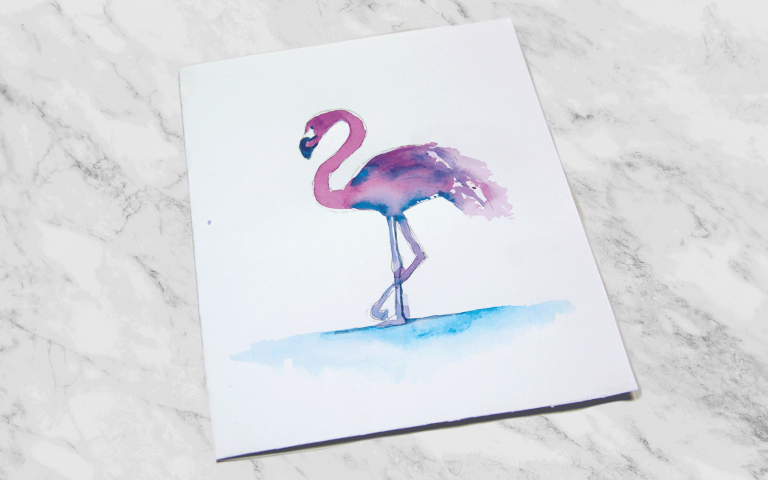 Eine Grußkarte mit einem Flamingo aus Aquarelltinte.