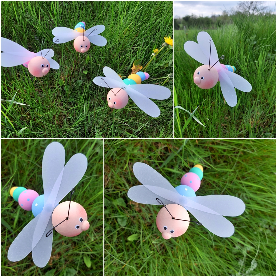Libellen aus bunten Holzkugeln beim Fliegen