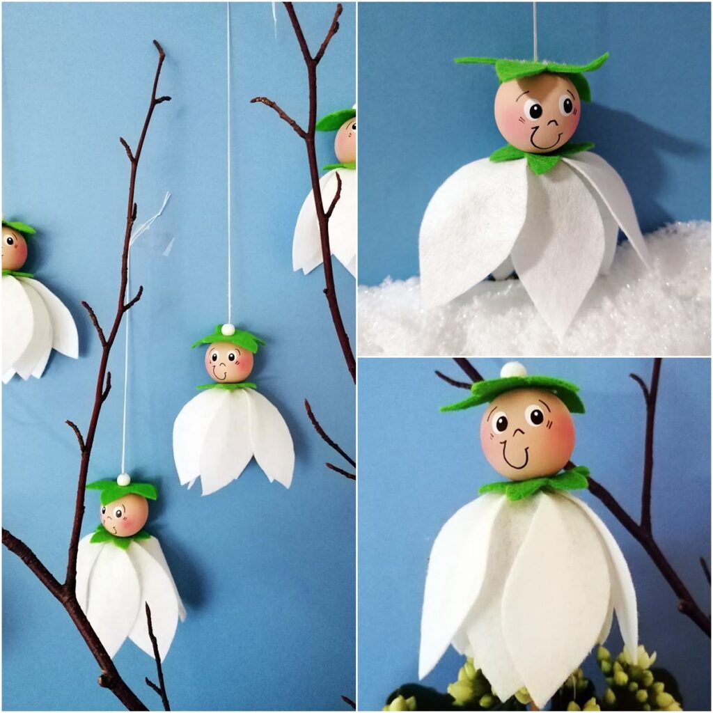 Schneeglöckchen als Dekofiguren am Zweig