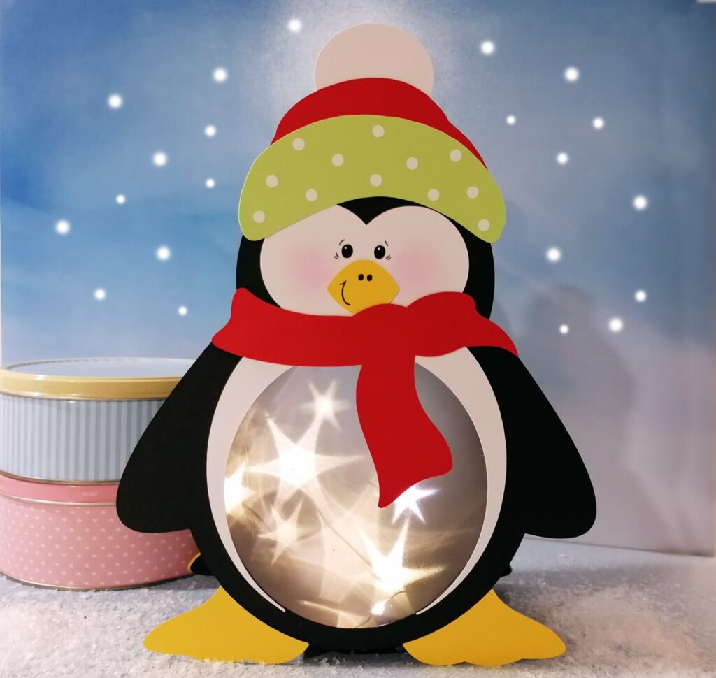 Beleuchtete Tischlampe als Pinguin